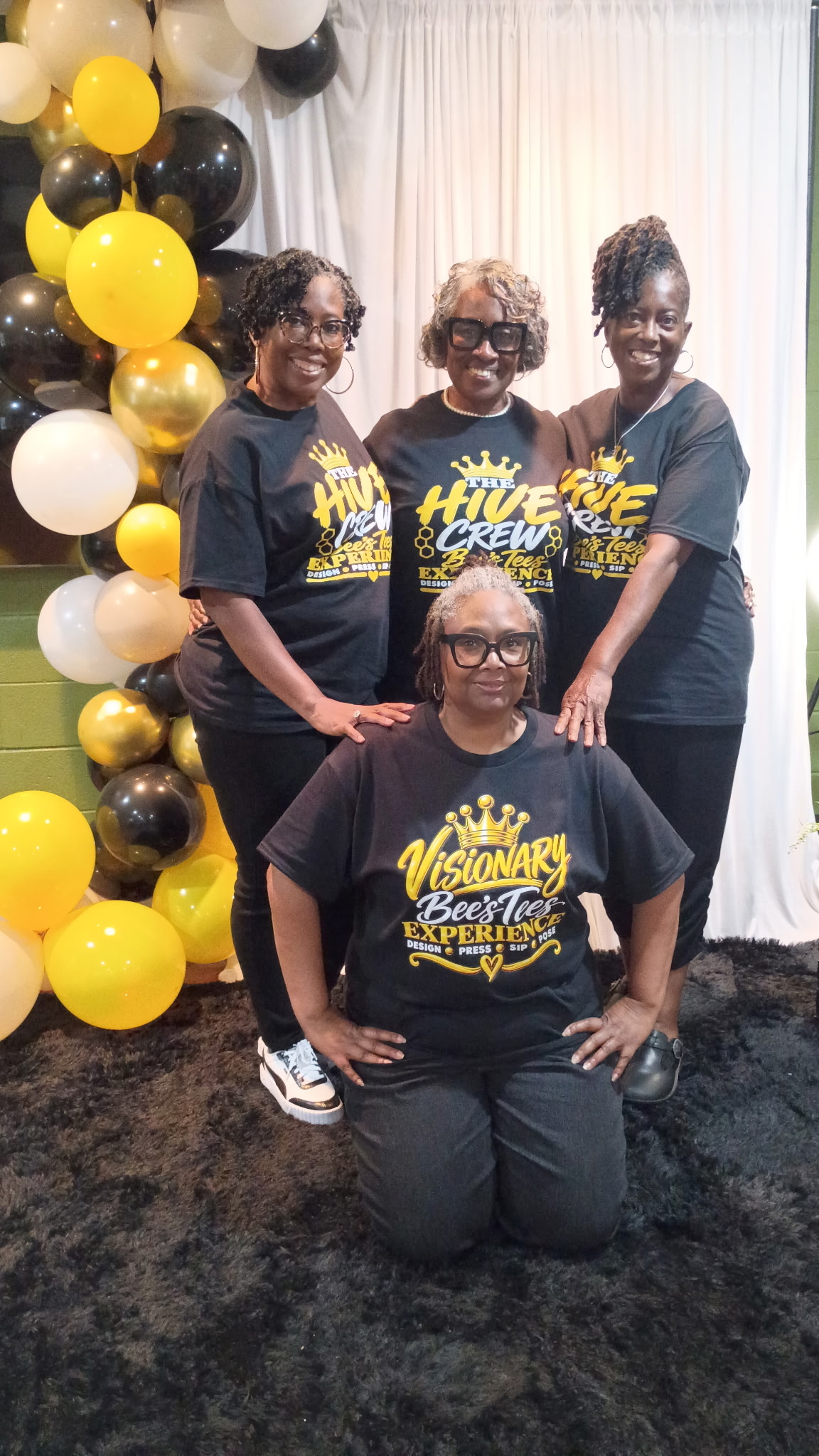 Bee’s Tees Hive Crew and Visionary wearing black and gold event shirts