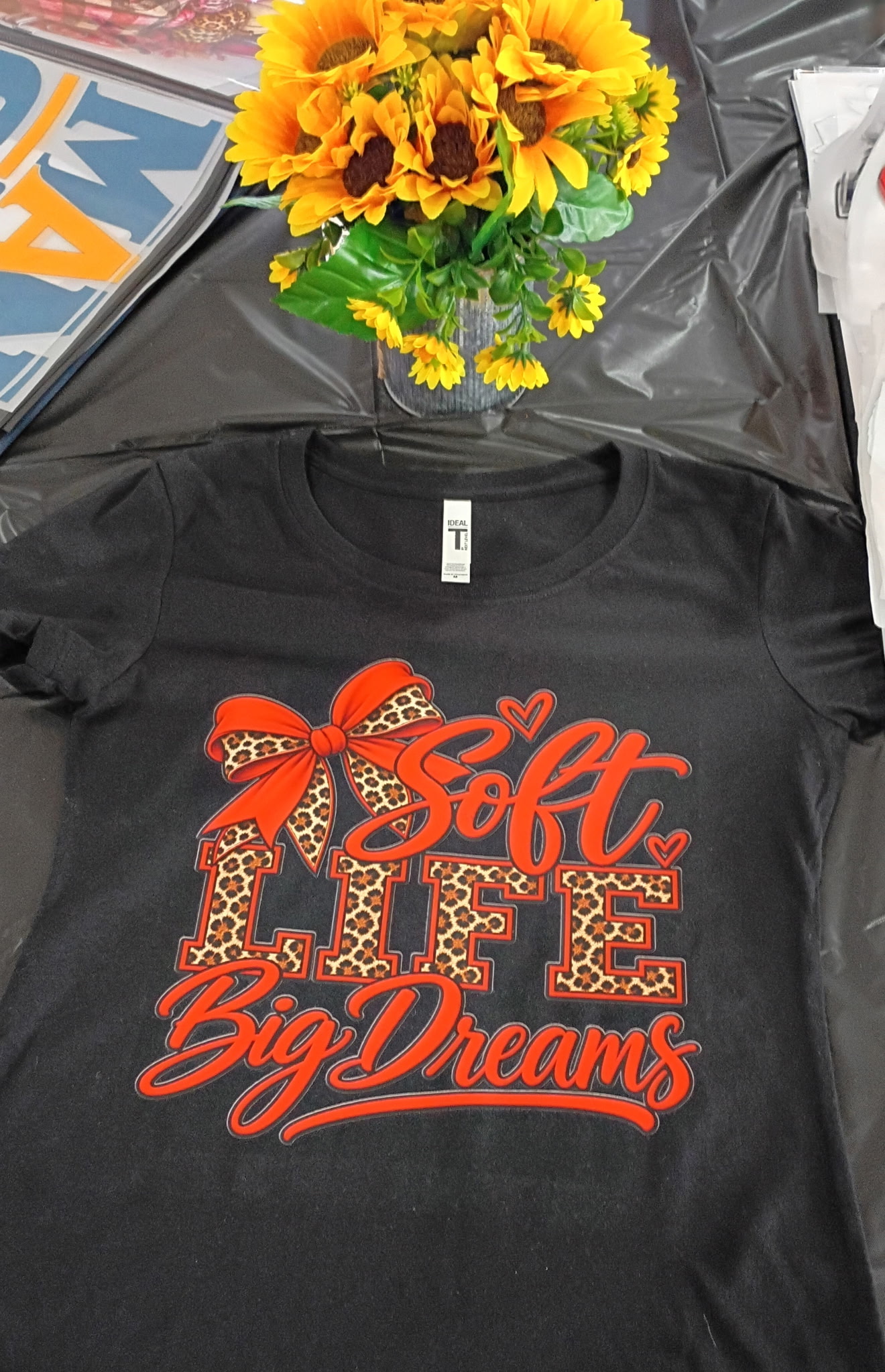 Custom Big Dreams shirt displayed at the event